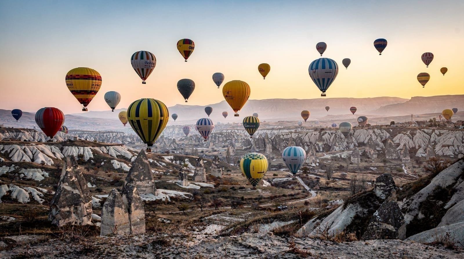 Cappadocia hot air balloon: which flight to book in 2026 — Honest comparison of Cappadocia balloon rides — standard, Royal Queen, and budge